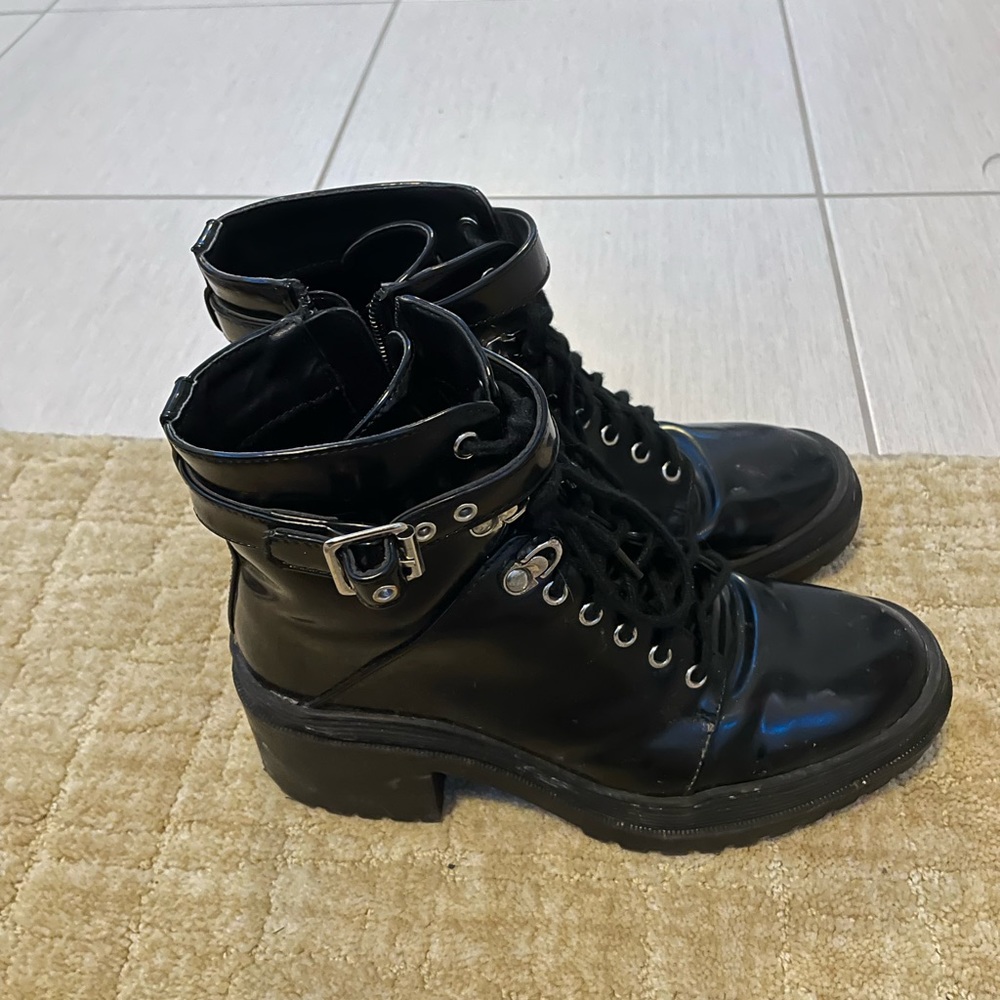 Black combat heeled booties